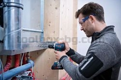 Акумулаторен ударен винтоверт Bosch GSB 18V-90 C, Без батерия и зарядно устройство в Куфар L-BOXX